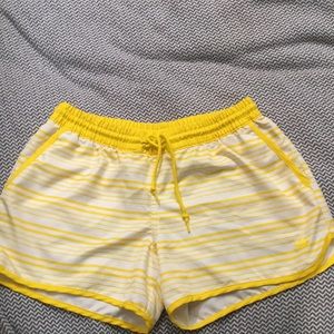Yellow and white Adidas shorts
